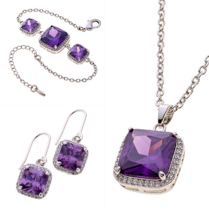Square shaped gemstones are surrounded by clear cubic zirconia gems